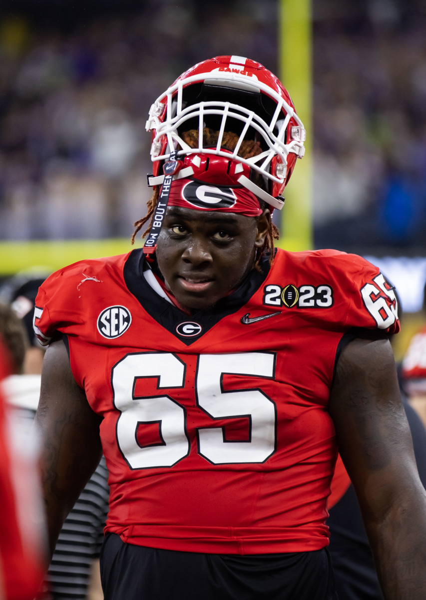 Jan 9, 2023; Inglewood, CA, USA; Georgia Bulldogs offensive lineman Amarius Mims (65) against the TCU Horned Frogs during the CFP national championship game at SoFi Stadium. Mandatory Credit: Mark J. Rebilas-USA TODAY Sports